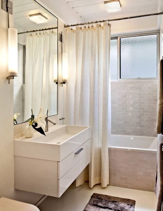 вариант светлого дизайна ванной комнаты в бежевом цвете